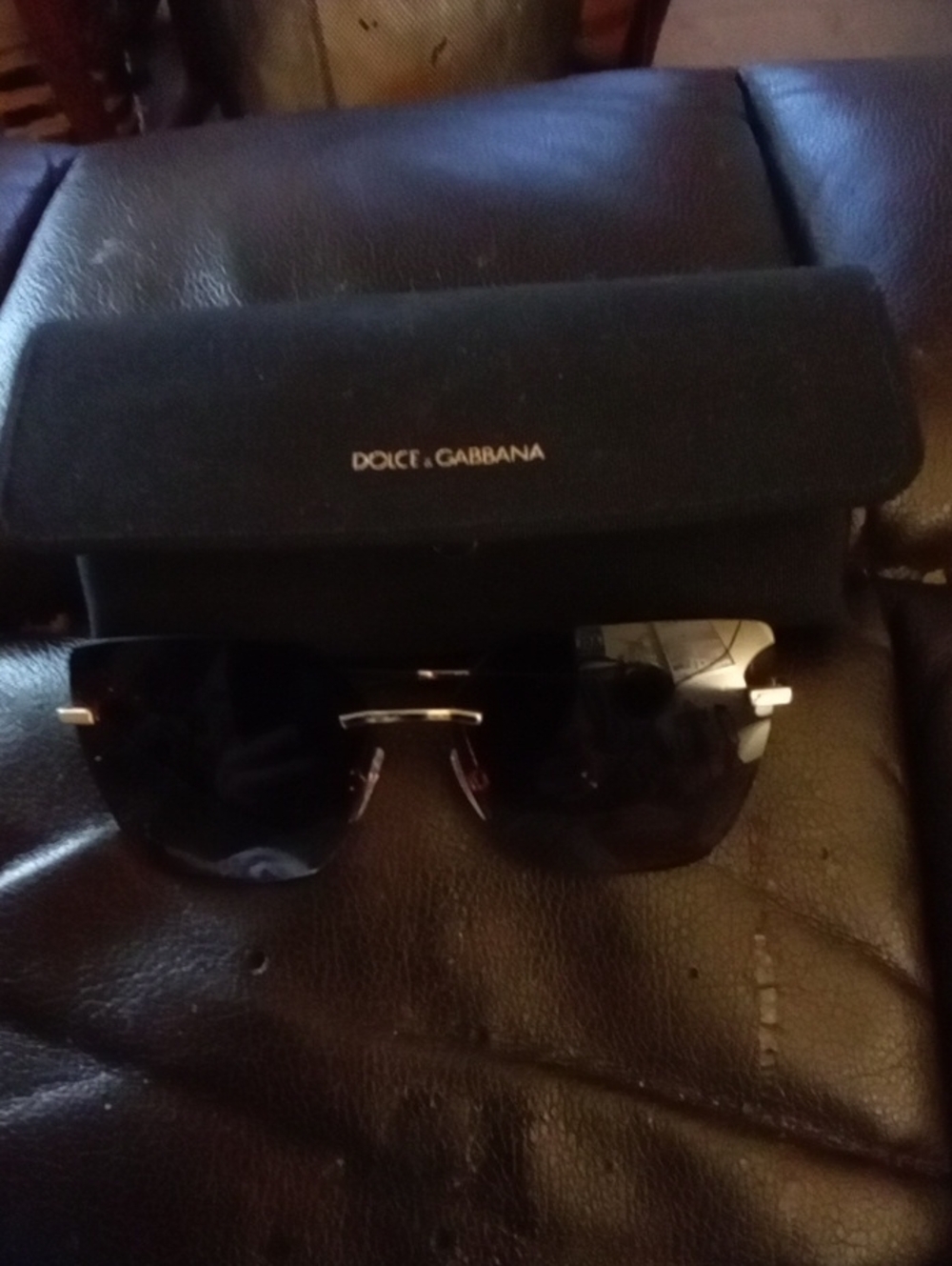 Dolce & Gabbana Black and Gold Rimless Sunglasses